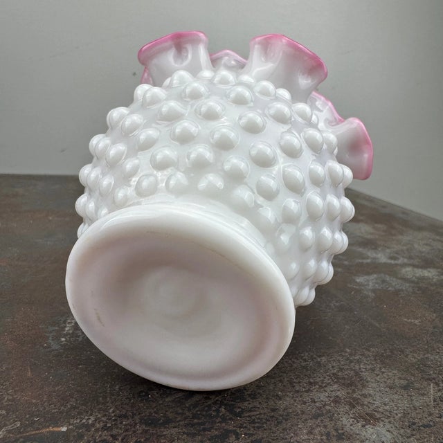 Beautiful vintage Fenton pink and white milk glass hobnail vase featuring the highly sought-after Peach Blow style. This...