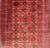 Mid 20th Century Vintage Hand Knotted Tukomen Ersari Rug in Red Background With Gul Design For Sale - Image 9 of 13