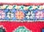 A vintage petite Moroccan rug with bold geometry and saturated color, woven with a large central green diamond medallion...