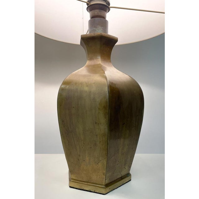 Mid-Century Modern Pair of Bronze Table Lamps. Up to 250V (Europe/UK Standard).The wiring of this item may be original and...