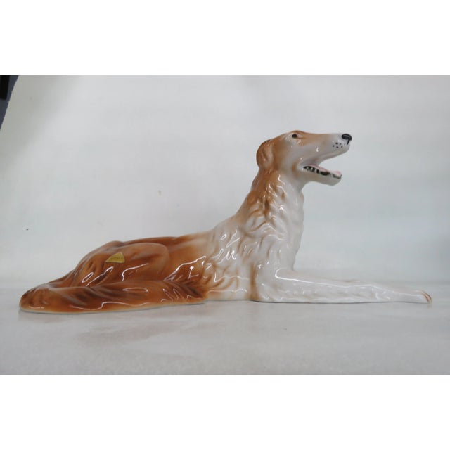 This beautiful Figurine is made of porcelain. This highly charming figurine is stamped as having been made in...