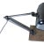 This vintage chrome desk lamp features an articulated arm, polished metal shade, and a solid stone base, blending...