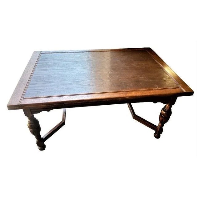 Handsome refectory table with a dark finish, acquired from the family of original owner who bought it new circa 1915 in...