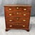 This 18th century chest is crafted from solid mahogany and features four spacious drawers fitted with classic brass pulls...