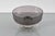 A centerpiece/bowl by Tapio Wirkkala, from the "Rovaniemi" series for Venini, Italy, 1972. Black filigree on smoked glass...