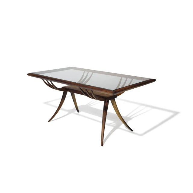 Mid century Brazilian coffee table designed by Giuseppe Scapinelli; crafted from Caviuna wood with exquisitely sculpted...