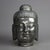 A Tibetan bust offers silver gilt ceramic bust of Buddha, 20th century Measures - 13''H x 8''W x 8.5''D.