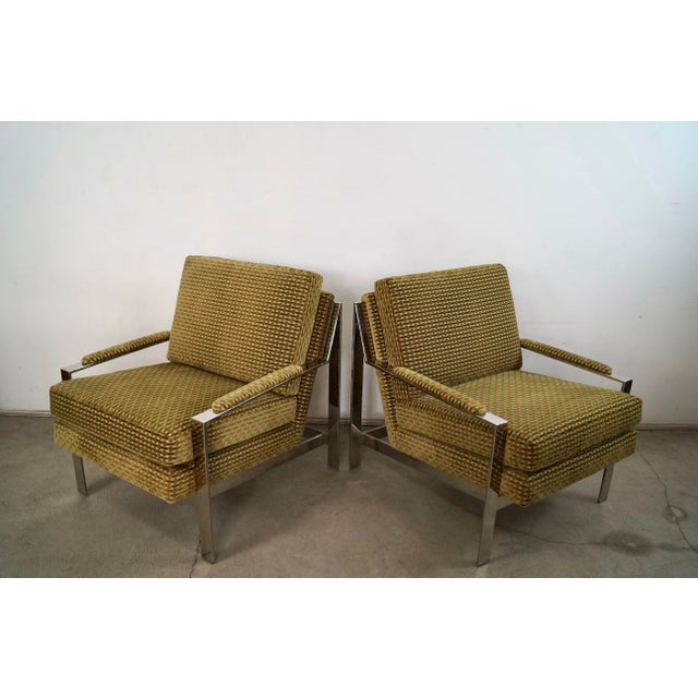 Pair of Mid Century Modern lounge chairs for sale. These are in the manner of Milo Baughman designs, and have been...