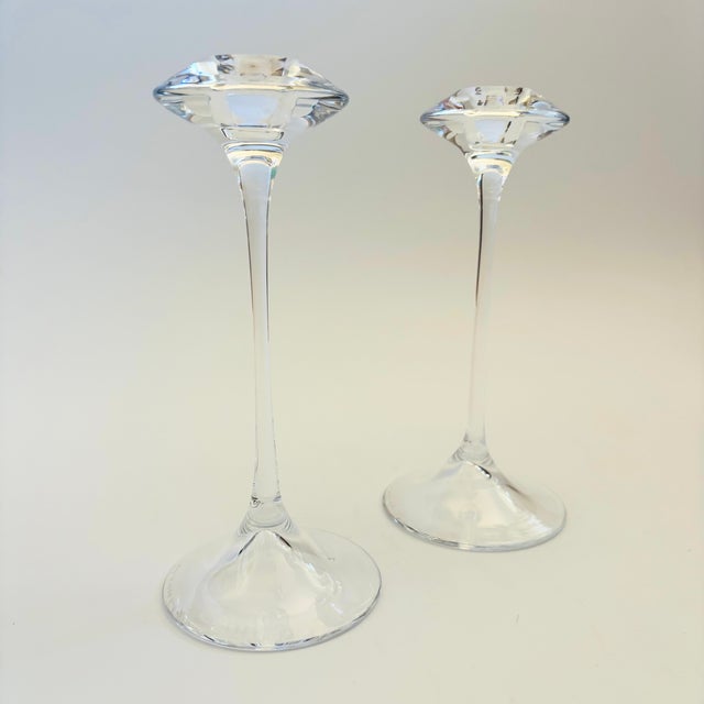 A set of 2 vintage mid century glass candlestick holders. Made in the "Fanfare" design by Kosta Boda, Sweden. Dramatic...