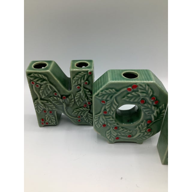 A beautiful vintage 1950s set of separate NOEL ceramic letter candle holders that are hand painted with red holly berries...