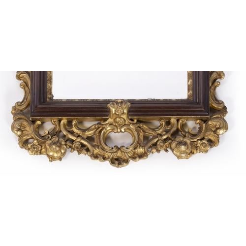 Mirror of King José I Portuguese, 18th century Rosewood frame with gilded carvings. Signs of use. Dimensions: 107 x 50 cm...
