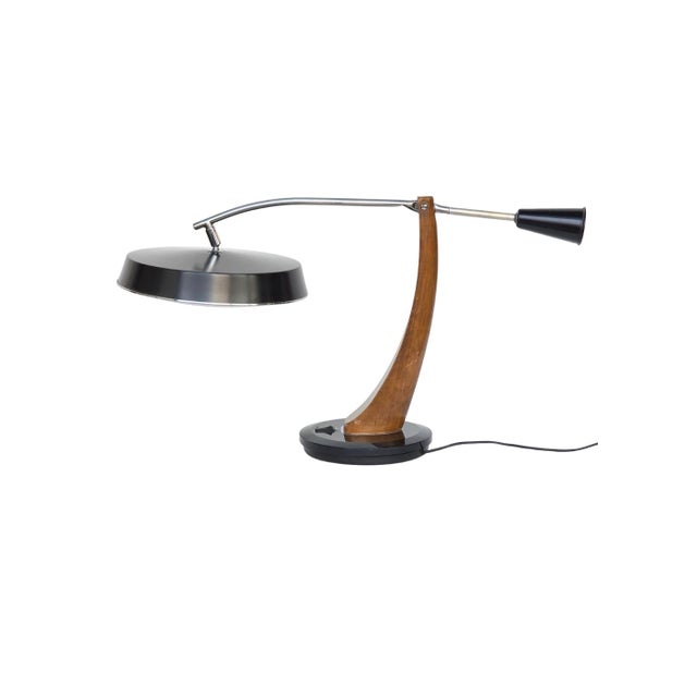 The Fase Pendulum (or President Pendulum) lamp is an iconic Spanish desk lamp from the 1960s and 70s, designed by...