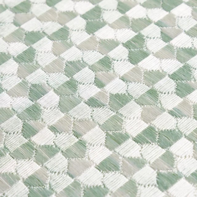 Ivins Embroidery in mineral is a fabulous full-coverage geometric pattern rendered in tonal yarns and dense...