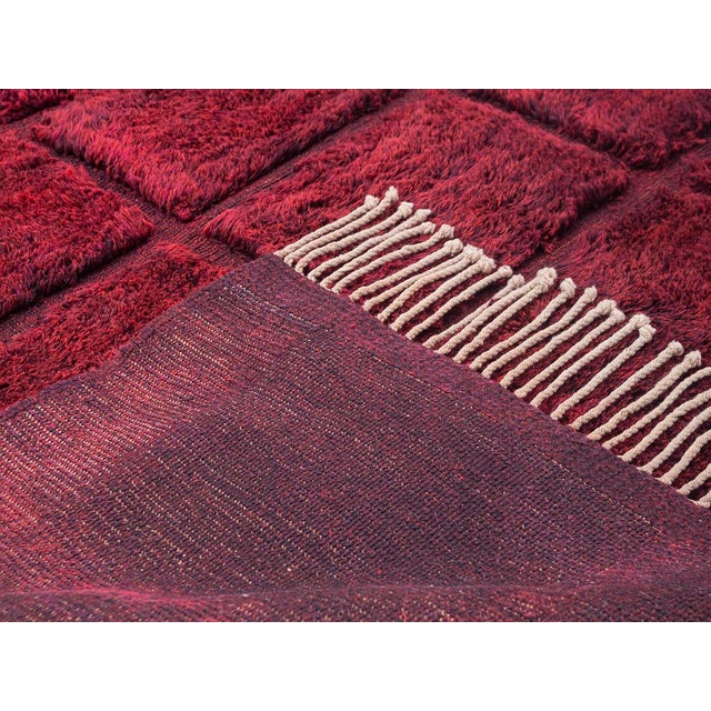 Striking contemporary hand-knotted wool rug featuring a structured grid composition in rich Burgundy, Dark Maroon, and...
