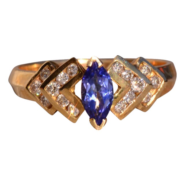 The 12th Avenue: Marquise Tanzanite and Diamond Ring in Yellow Gold For Sale