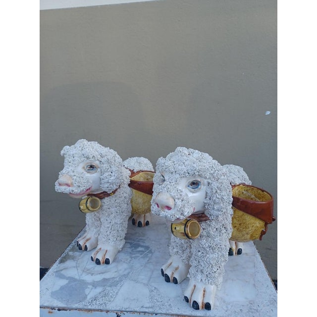 Vintage ceramic pair of Italiandog planters. Each dog has two small planters on each side...perfect size for a succulent...