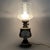 A superb furnishing element combining classic charm and absolute elegance. This imposing and majestic table lamp is a...
