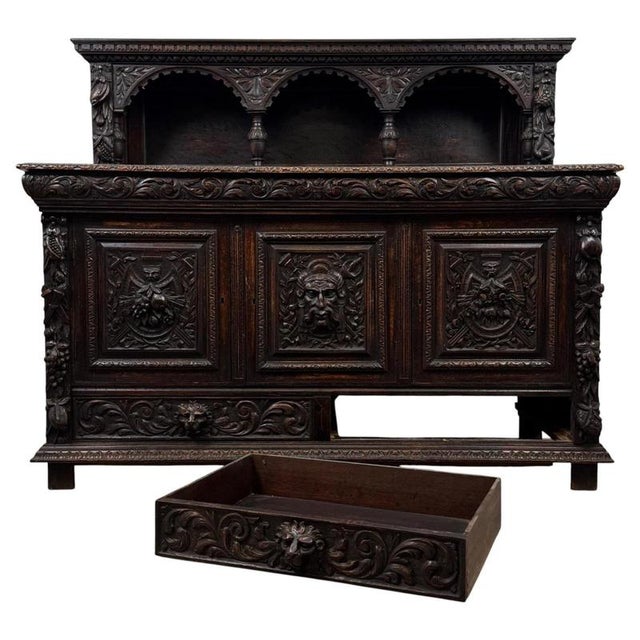 An outstanding and highly impressive 19th-century Victorian oak sideboard, distinguished by its extensive carved...