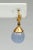 An unusual pair of drop earrings with a hoop-style fastener. They feature carved chalcedony gemstones with a melon-shape...