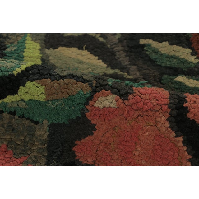 This 2x4 antique hooked runner is an exciting new addition to Rug & Kilim’s Antique collection—a folk-art masterpiece of...