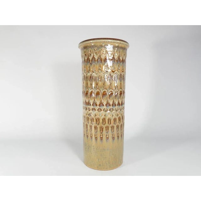 Handcrafted in the mid-20th century, this large (40 cm) and exquisite stoneware floor vase bear the distinctive mark of...