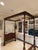 An exquisite specimen of an antique, American four poster canopy bed featuring beautiful carved details on the tester,...