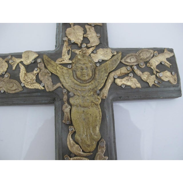 Unique Mexican folk art Milagros wall hanging cross. Hand carved wood with painted patinated pale turquoise/gray showing...
