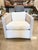 Palecek Kirk Nix Collection swivel lounge chair featuring a hardwood frame wrapped in hand-woven lampakanay rope in a soft...
