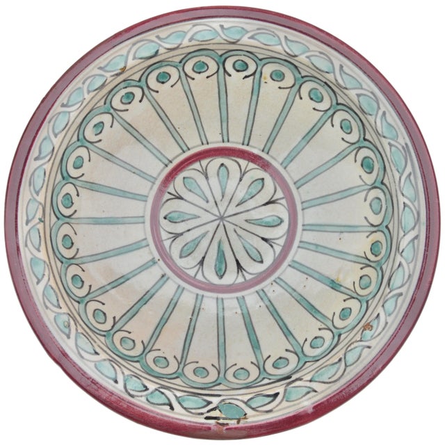 One-of-a-kind antique handcrafted and glazed Moroccan ceramic bowl from Fez. Featuring an elaborate hand-painted colorful...