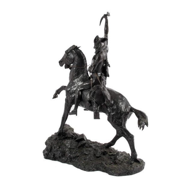This bronze sculpture depicts The Scalp, a dramatic Western scene inspired by the well‑known composition created by...
