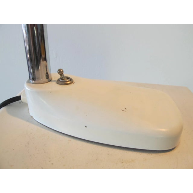 This white desk lamp was designed by h. Th. J. A. Busquet and produced by hala zeist in the 1960s. This piece has an...