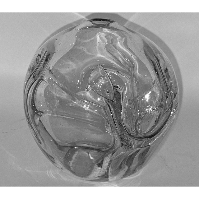 A rare early studio glass vase by Paul Manning, etched with a whimsical stick figure and the year ’73 on its base. This...