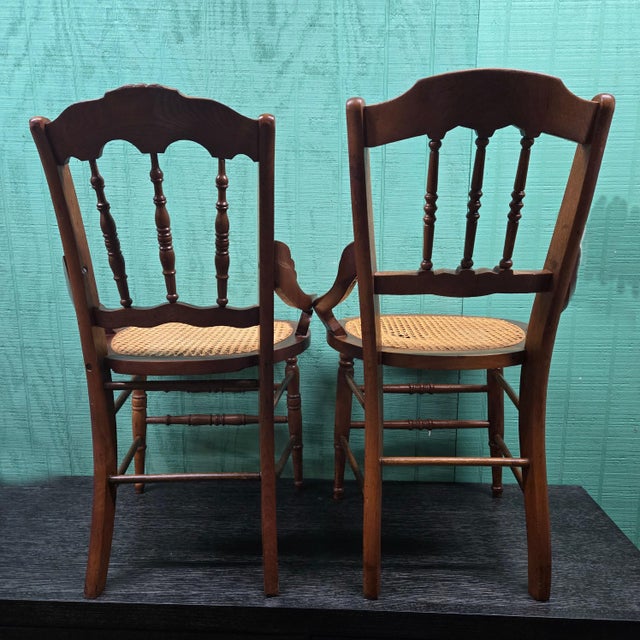 This set of chairs is adorable and screams vintage! Each chair features a tan wicker seat to complement the dark brown...