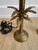 A striking , small but heavy pair of Chapman-attributed vintage cast brass palm tree table lamps, circa 1960s–1970s. Each...
