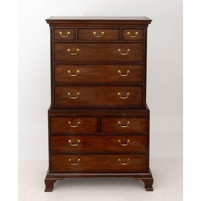 Kittinger George III Style Mahogany Chest on Chest, the top portion with three short drawers above three long drawers and...