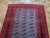 Hand-knotted rug from Lahore, Pakistan with a Turkmen pattern of the Tekke tribe. This pattern, also known as "Bukhara or...