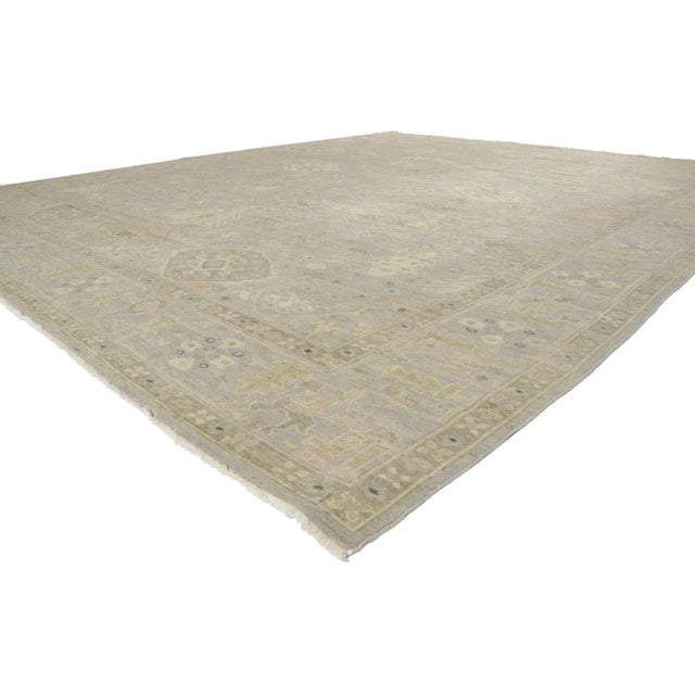 30832 Distressed Oushak Rug 12'00 x 14'07. Emanating traditional sensibility and rugged beauty with nomadic charm, this...
