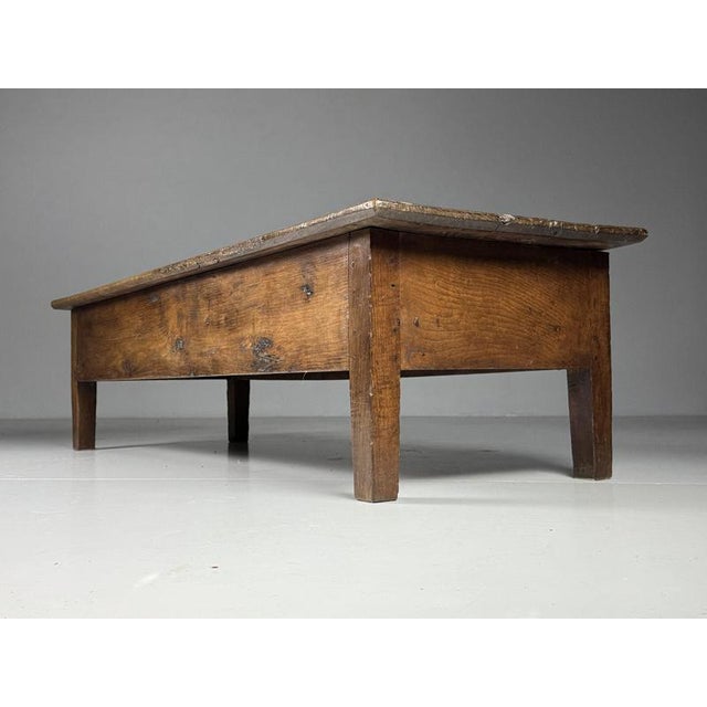 Spanish farmhouse coffee table. Originally from Spain, 18th century. Two drawers on the long side. In good condition!...