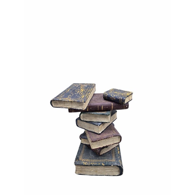 Vintage Regency Style Faux Stacked Book Side Table This piece features a charming design that mimics a stack of vintage...