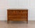 A well-proportioned Louis XVI–style chest of drawers crafted in walnut, dating from the early 19th century. The façade...