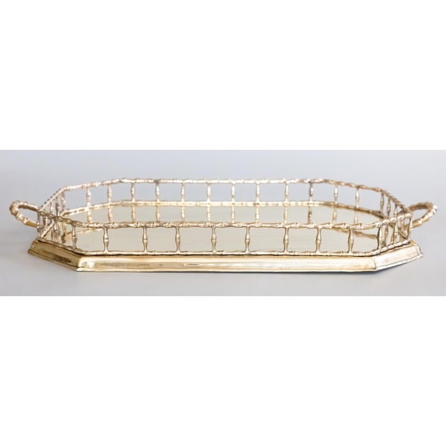 A stylish vintage Mid-Century faux bamboo polished brass octagonal gallery tray with handles. Marked "Leonard India". A...