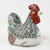This stunning vintage Chinese porcelain covered bowl is expertly sculpted into the form of a seated rooster, serving as a...