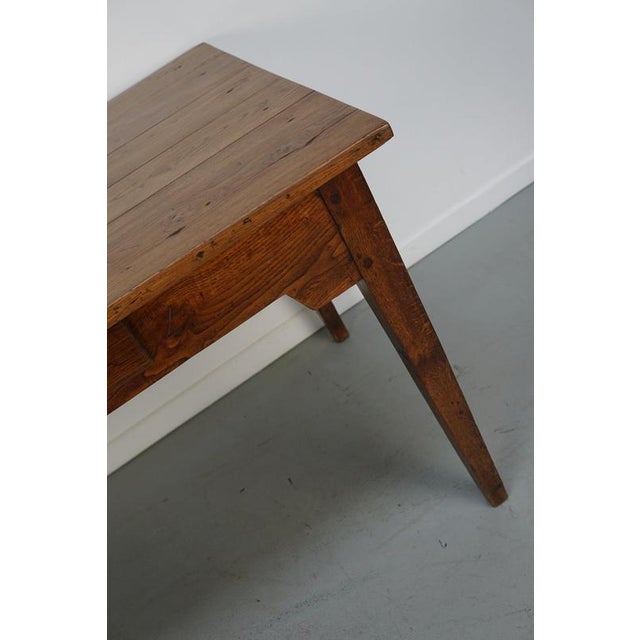 This elegant table was made in France in the late 19th century. The table was made in solid oak with beautiful grain...