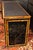 English circa 1880s bamboo and faux lacquer double pedestal desk. Original Aesthetic Movement brass pulls. Front bracket...
