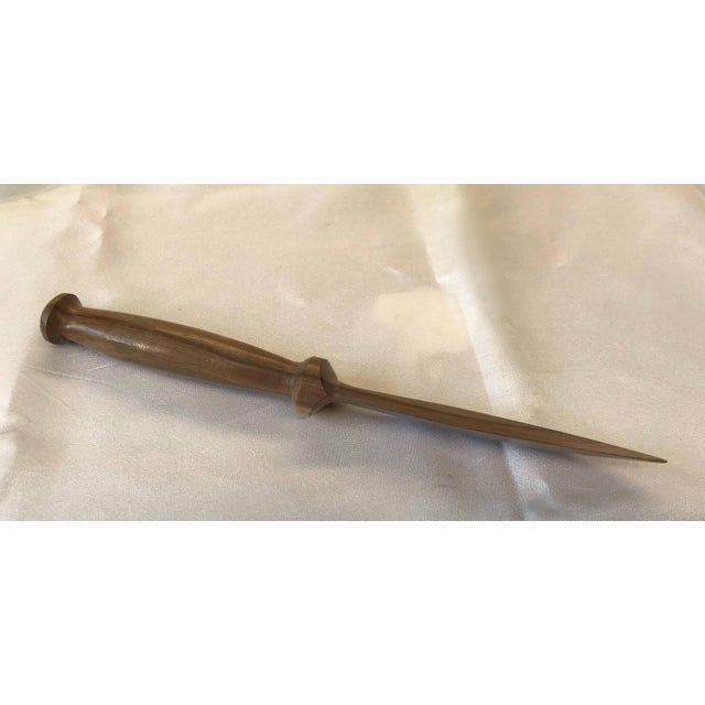 The grains of the wood in this hand-carved letter opener are stunning. The person that carved this placed the styling to...