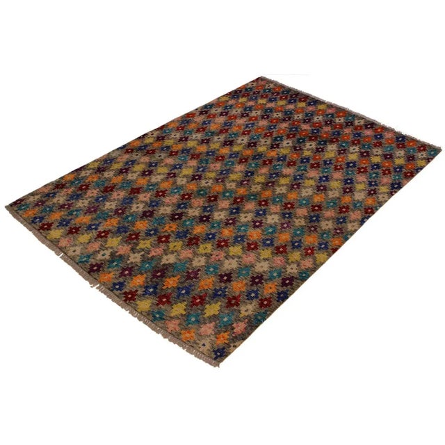 A mesmerizing addition to any décor, this exhilarating hand-knotted rug featuring exquisite coloration in an intricate...