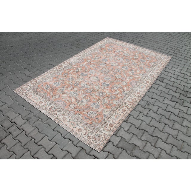 This gorgeous traditional hand knotted Vintage Anatolian rug is approximately 60 years old in excellent vintage condition....