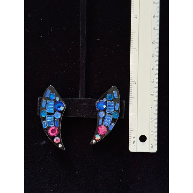 These signed and dated original Bill Schiffer of New York earrings are colorful and elegant. They are very light and...