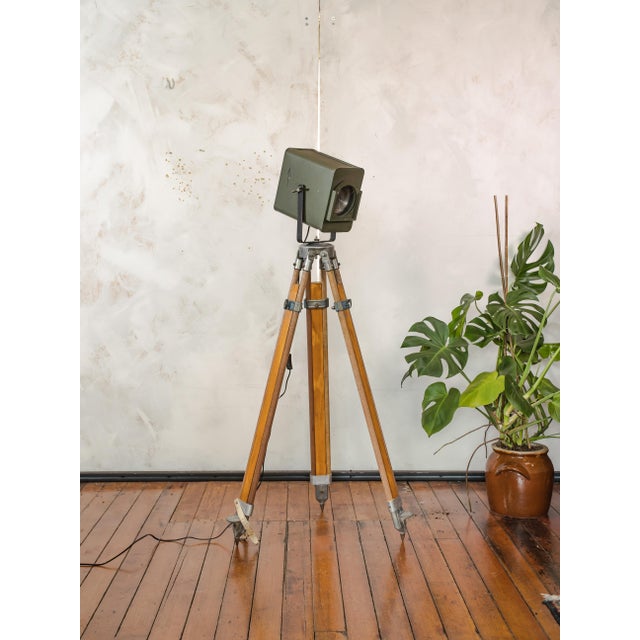 Vintage green 1960s strand electric patt 45 theatre light on a wooden surveying tripod | industrial floor lamp, retro...
