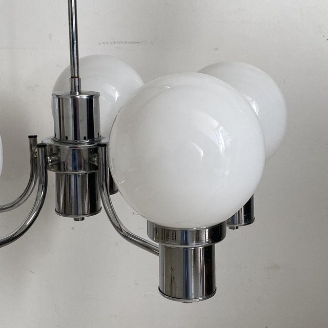 Vintage 1970s chrome and white glass pendant light Height: 50 cm Width: 50 cm Depth: 50 cm Globe diameter: 14 cm Up to...